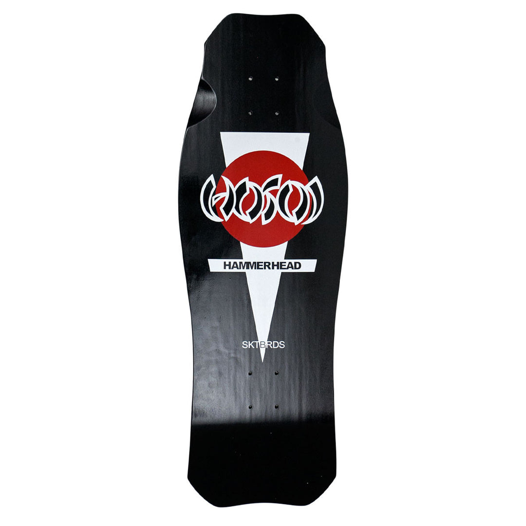 Hosoi Og Hammerhead skateboard deck: A white downward-pointing triangle with a red circle and a white outlined Hosoi logo, with the word Hammerhead beneath, on a black hammerhead-shaped deck. Small Sktbrds text sits lower down.
