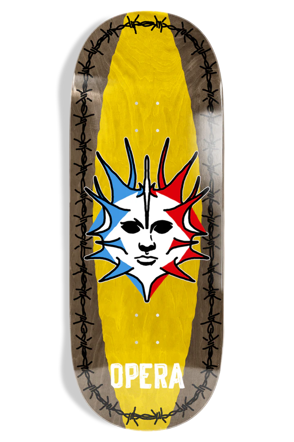 Opera Fatties Torn Spike skateboard deck: Wide, oversized shape with a yellow centre band framed by barbed wire along each edge. A spiky sun-like mask with a blank white face is split into red, white and blue, above the white 'Opera' wordmark.