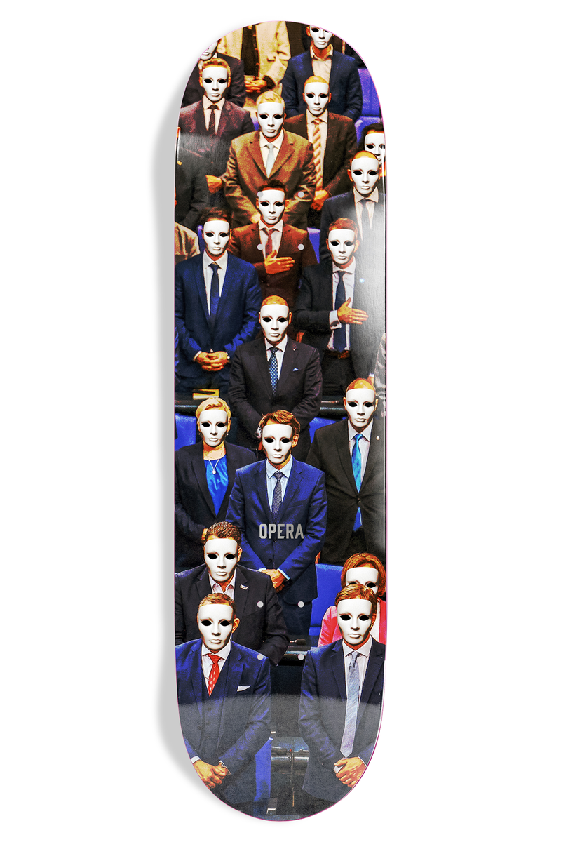 Opera Meritocracy skateboard deck: Photograph of rows of formally dressed men and women in suits, all wearing blank white masks, seated in a chamber with hands on chests. Opera label in small letters on the central jacket.