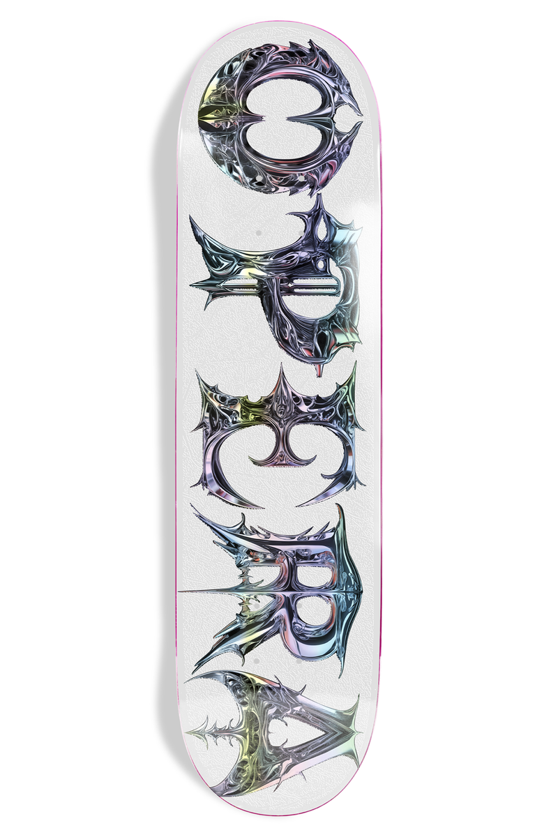 Opera Neo EX7 (White) skateboard deck: Spiky gothic Opera lettering rendered in shiny iridescent chrome, running vertically down a white deck.