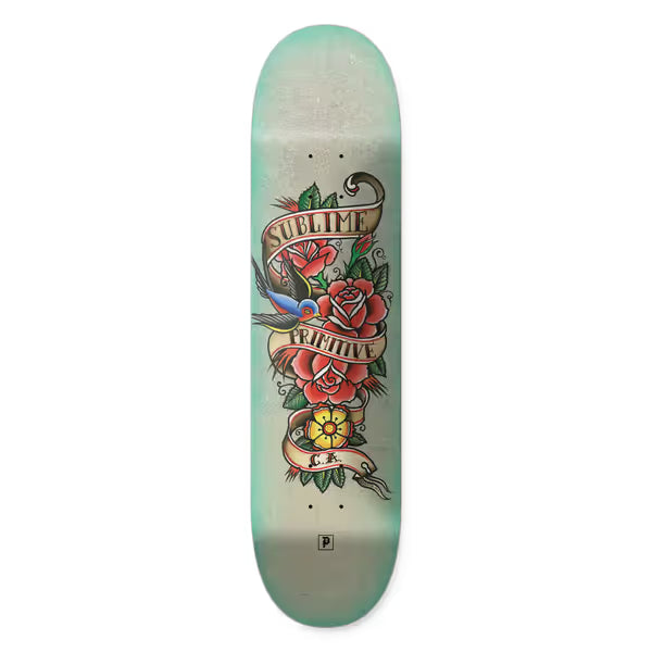 Primitive x Sublime Tradition skateboard deck: A traditional tattoo-style design of red roses, a blue and orange swallow, a yellow flower and scrolling banners reading Sublime and Primitive, on a mint green and cream deck.