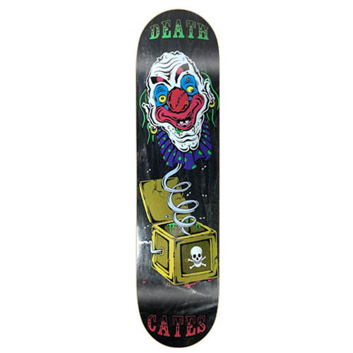 Death Skateboards Death Benson Devil Woman skateboard deck: Menacing clown head with a ruffled collar springing from a yellow jack-in-the-box marked with a skull and crossbones, on a black deck, with Death and Cates in lettering at either end.