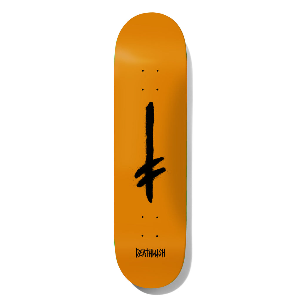 Deathwish Credo Orange Black Dip 8.5 skateboard deck: Black hand-painted Deathwish sword-like cross symbol in the centre of a plain orange deck, with the Deathwish name in small black lettering near the tail.