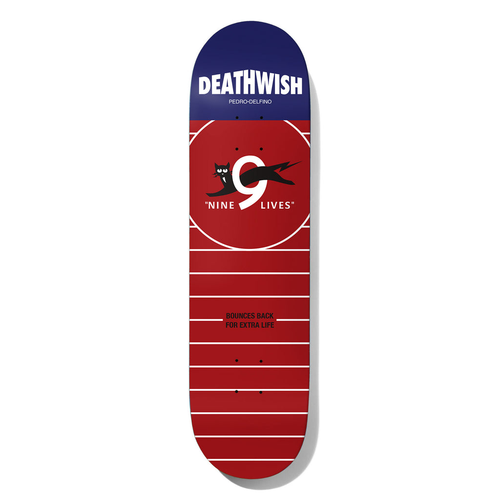 Deathwish Delfino Nine Lives 8.5 skateboard deck: A red deck with white lines and a large circle, a black cat leaping through a number nine, and a navy nose with the brand name. Small text below the circle reads bounces back for extra life.