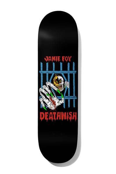 Deathwish Foy Deathwitch Trials 8.5 skateboard deck: Skeletal hand with green claws grips blue prison bars while a hooded, yellow-faced skull peers from behind them. Rider name in dripping red lettering above and Deathwish logo below, on black.