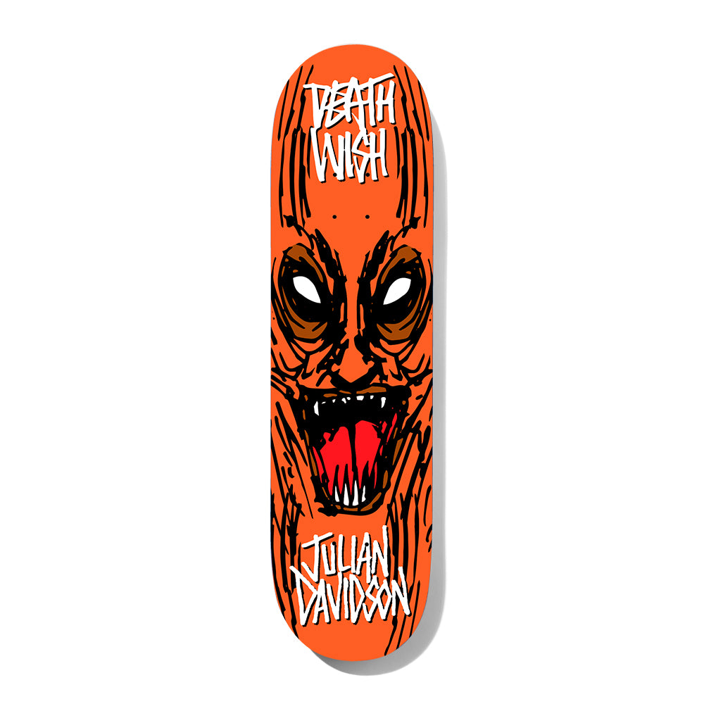 Deathwish Julian Macabre 8.125 skateboard deck: A hand-drawn snarling orange demon face with white eyes, red open mouth and sharp teeth, with scratchy black lines across an orange deck. The Deathwish logo is at the top and the rider name at the bottom in white scrawled lettering.