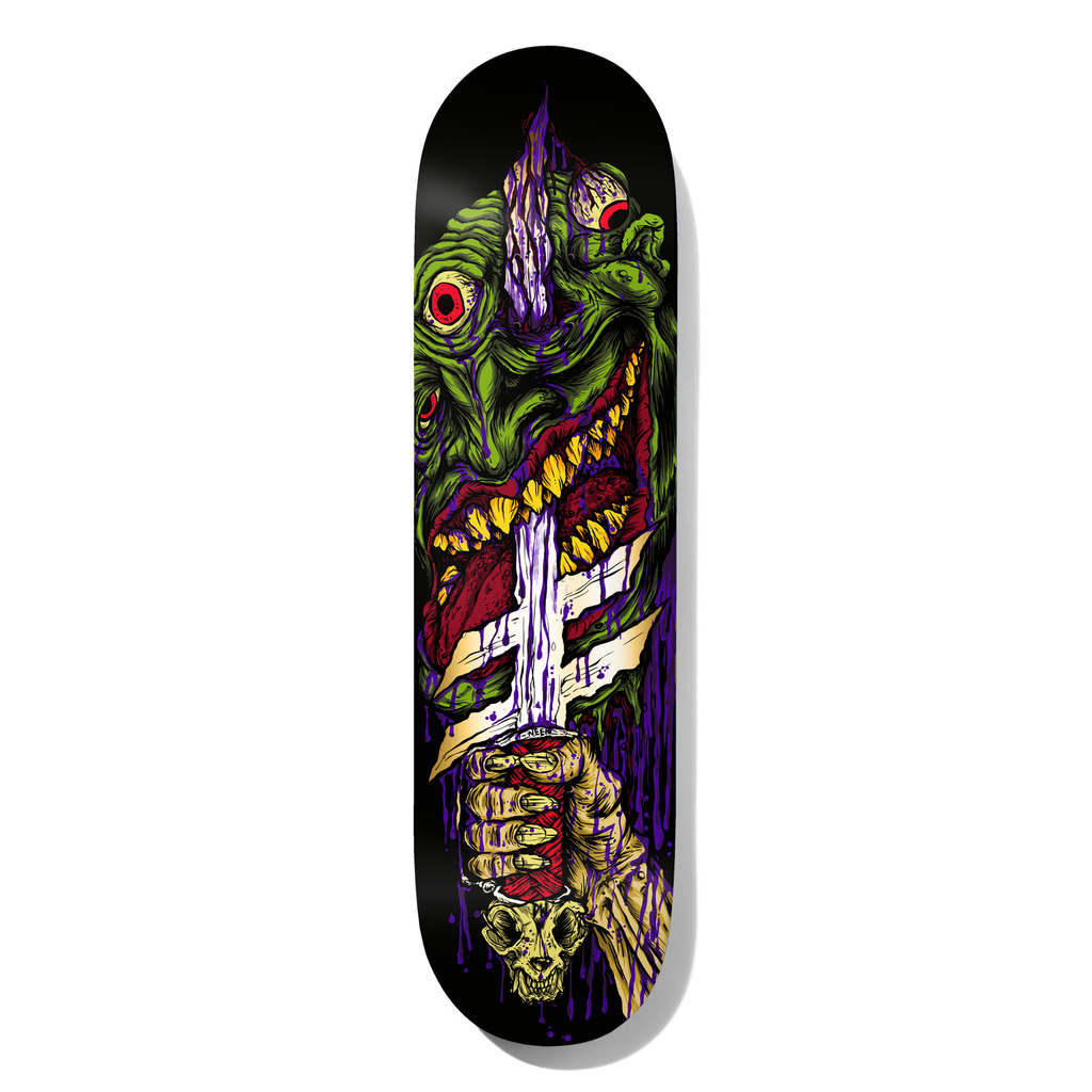 Deathwish Neen Slayer Twin 8.5 skateboard deck: A green monster head with red eyes, a toothy grin and a purple spike through its forehead, impaled on a dagger held by a clawed, bandaged hand with a cat-like skull pommel. Purple drips run down a black background.