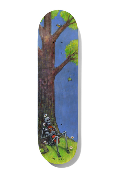 Deathwish Pedro Clearing At The End of the Path 8.25 skateboard deck: Painted scene of a skeleton sitting against a large tree trunk on a grassy slope, holding a violin, with white flowers around it. A small bird perches on a branch against a blue sky, and a leaf falls.