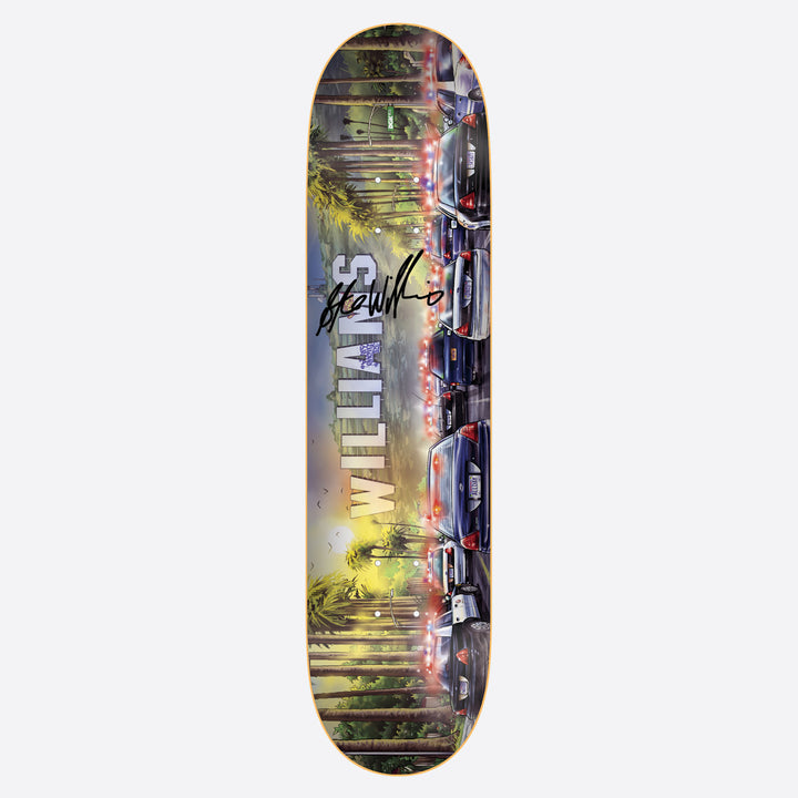 DGK Autographed Pursuit Stevie Williams 7.9 skateboard deck: Painted scene of a palm-lined street at sunset with a line of police cars, lights flashing, down the right side, the name Williams in large letters and a black autograph across it.
