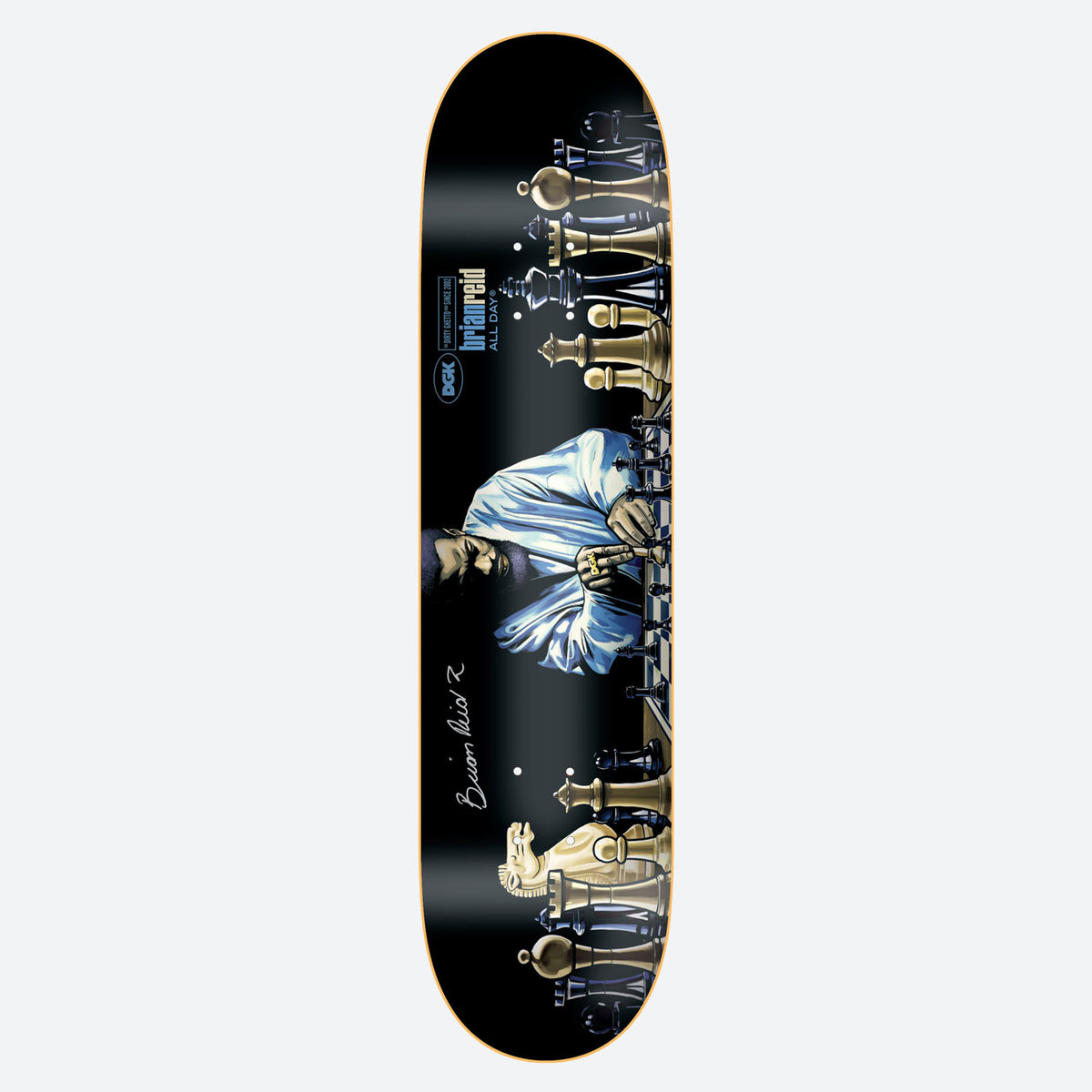 DGK Autographed Next Move Reid 8.25 skateboard deck: Black deck showing a figure in a pale blue robe seated at a long chess board, with large gold and dark chess pieces lining both ends. A printed signature sits near the tail, and the DGK and rider logo near the nose.