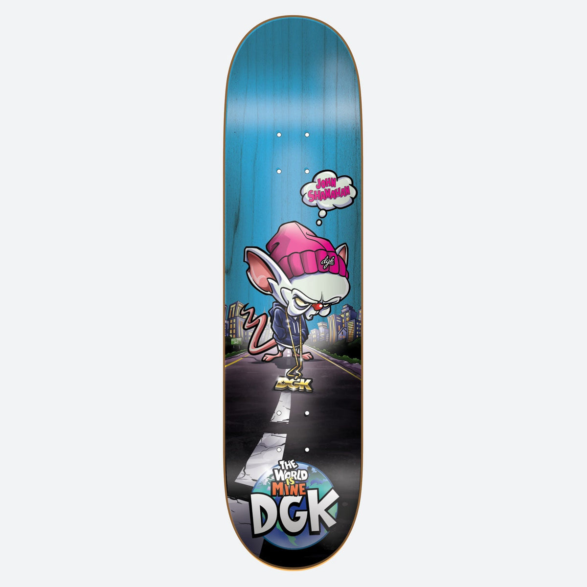 DGK Big World Shanahan 8.5 skateboard deck: A cartoon white lab mouse in a pink beanie and hoodie stands on a city road, with a thought bubble reading the rider's name and a globe reading 'The World is Mine' above the DGK logo, on a blue wood-grain deck.