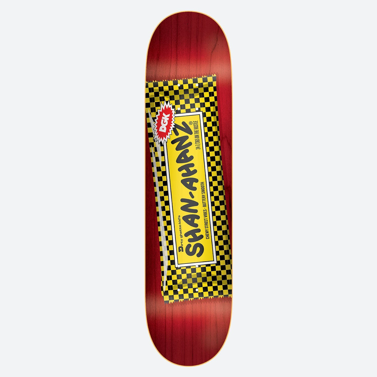 DGK Chewy Shanahan 7.9 skateboard deck: Deck made to look like a chewing gum or candy bar wrapper: yellow and black checkerboard label with 'Shan-Ahanz' text and a DGK starburst, over a red wood-stained deck.