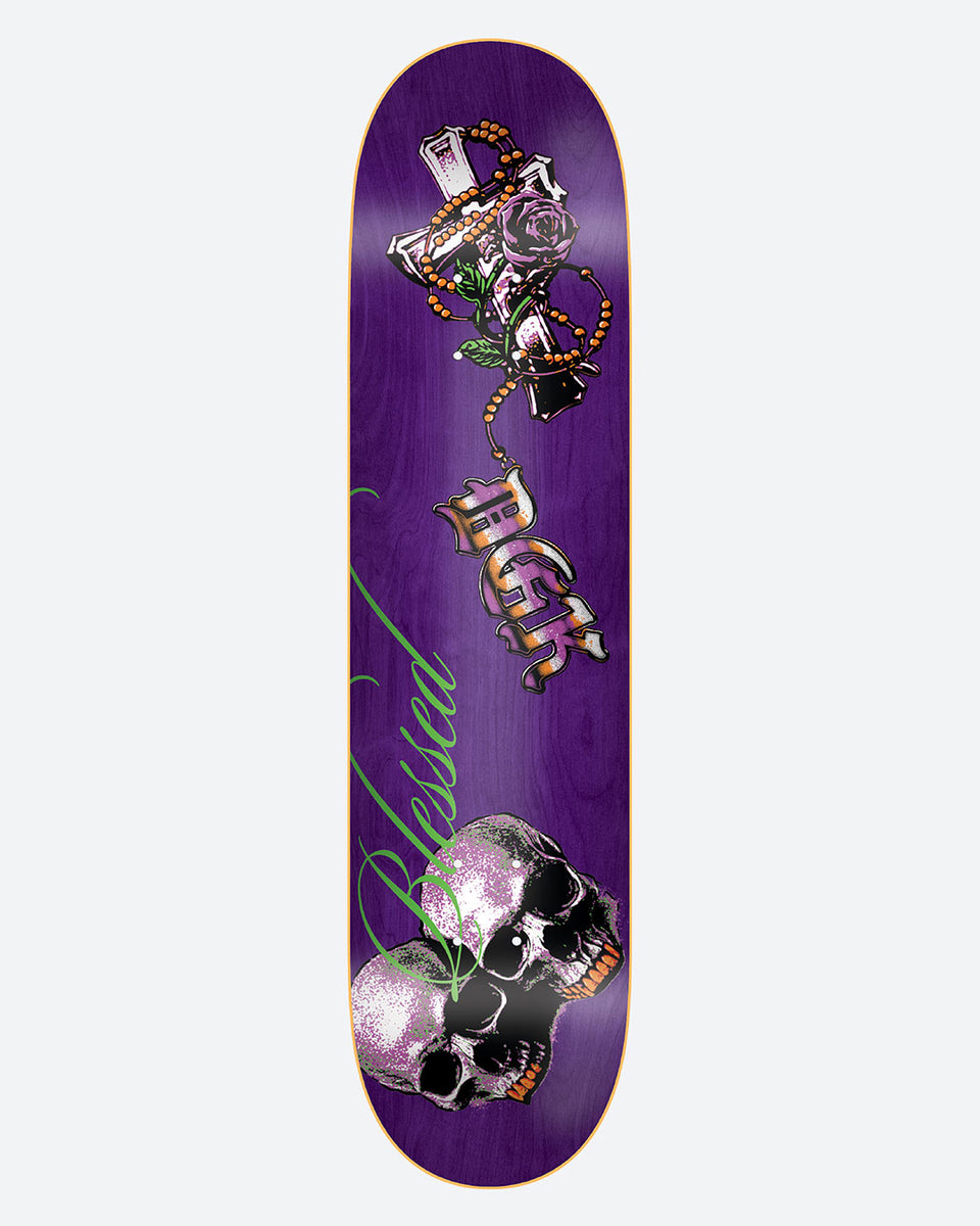 DGK Crypt skateboard deck: Gothic cross wrapped in rosary beads and a purple rose, a DGK logo in old-English lettering, two speckled skulls at the bottom and green script lettering, on a purple deck.