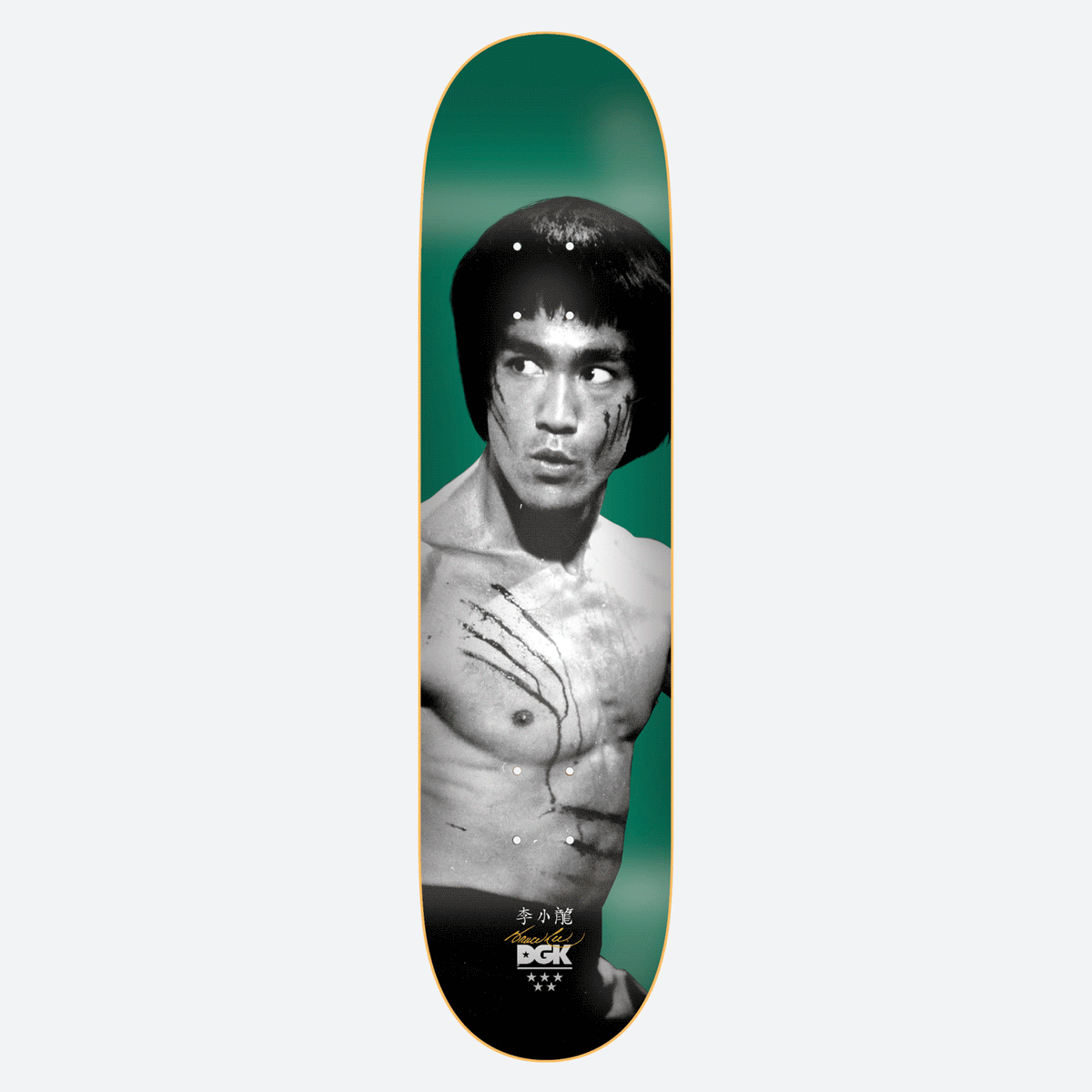 DGK x Bruce Lee Emerald Golden Dragon Lenticular skateboard deck: Black and white photograph of a shirtless martial artist with claw scratches across his chest and cheek, looking to the side on an emerald green background. Chinese characters, a signature and the brand logo sit at the bottom.