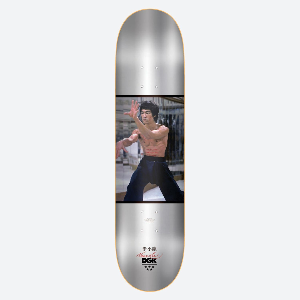 DGK x Bruce Lee Like Echo skateboard deck: Colour photograph of a shirtless martial artist in a fighting stance in a mirrored room, set in a band across a brushed silver deck. Chinese characters, a red signature and the DGK logo with three stars below.