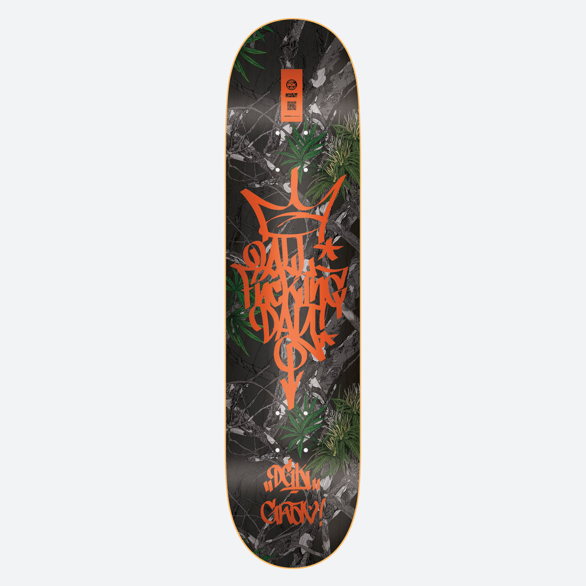DGK x Grav Survival 8.25 skateboard deck: Orange graffiti tag with a crown reading All Fucking Day over a dark camouflage-style foliage background with green plants. Small orange label at the nose and tag text near the tail.