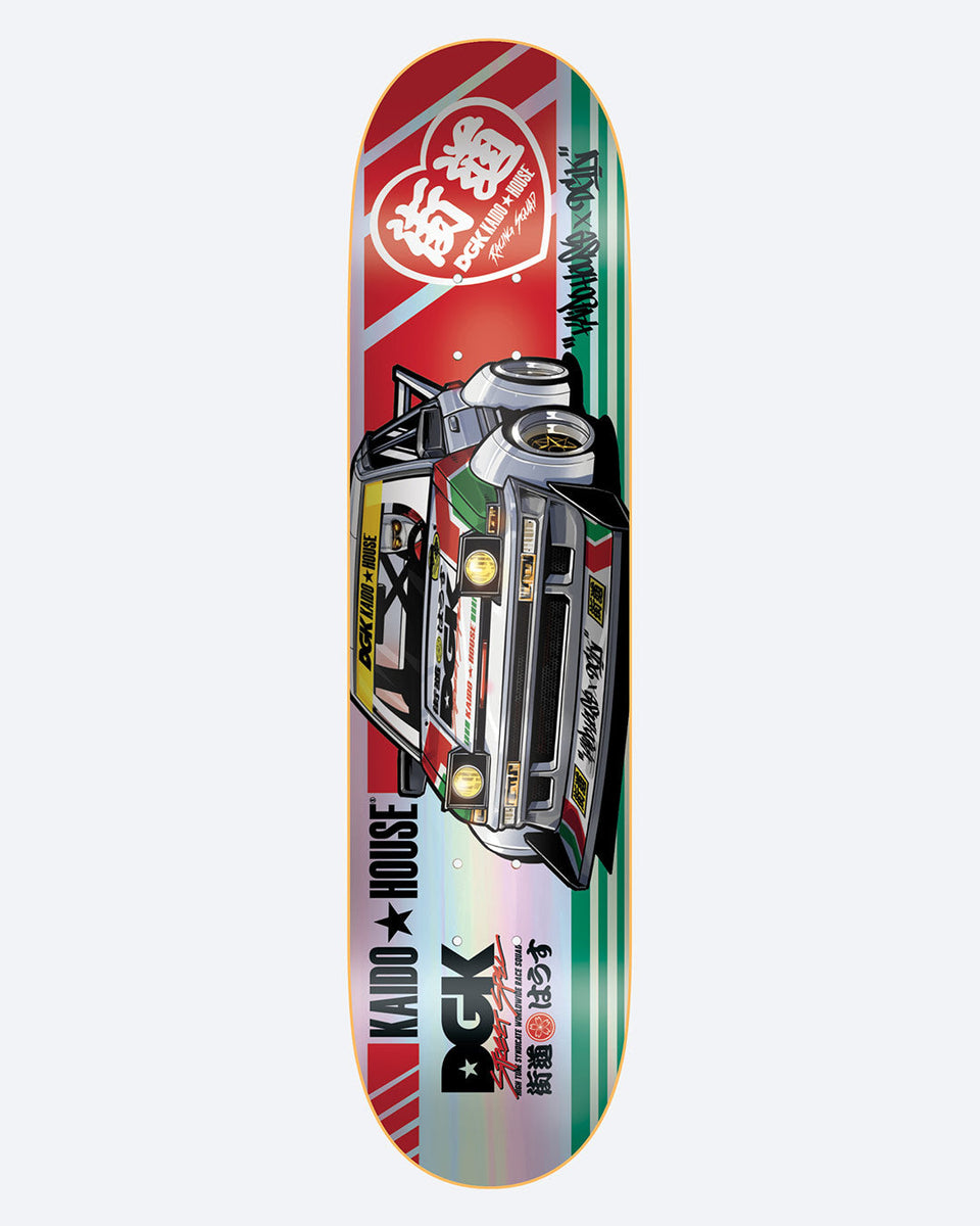 DGK x Kaido House Raceway Rainbow Prismatic skateboard deck: Illustration of a rally-style racing car viewed from the front, on a red and silver prismatic background with green stripes, a heart-shaped Kaido House logo at the top and DGK and Kaido House branding with Japanese text at the foot.