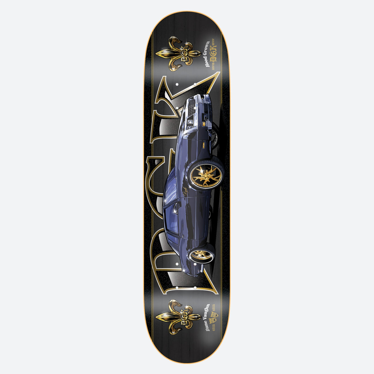 DGK Gris Gris Vaughn skateboard deck: Dark blue lowrider-style car with gold wheels in the centre of a black deck, flanked by large gold DGK letters and fleur-de-lis emblems. Gold outlines and small gold text frame the design.