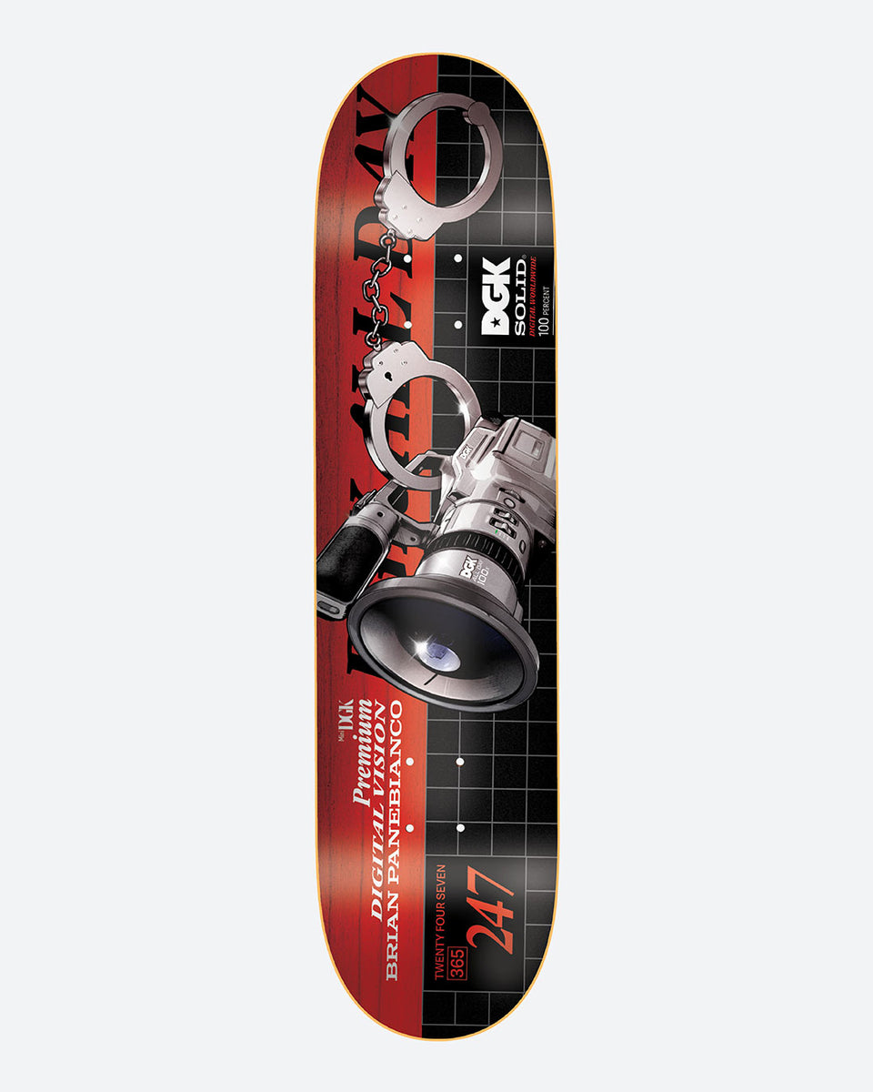 DGK Premium Vision Panebianco Street Soldier skateboard deck: A silver video camera with a loudhailer-style lens and a pair of handcuffs, set on a red and black grid background resembling a camcorder screen, with a 247 date-stamp style badge and DGK Solid logo.