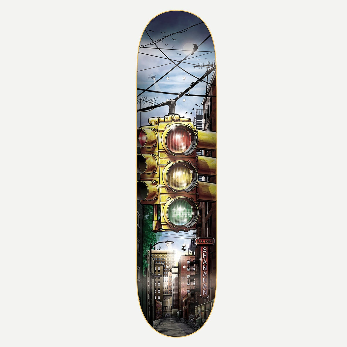 DGK Signals Shanahan 7.9 skateboard deck: Illustrated dusk city alley with a large yellow traffic light in the foreground, power lines, a crow and a moon overhead, and a red vertical neon sign reading the rider's name.