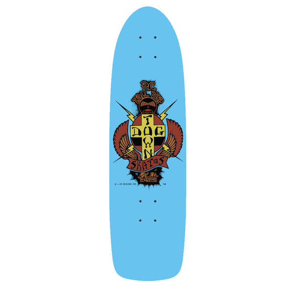 Dogtown PC Tail Tap OG 70s Classic x 30 skateboard deck: Old-school Dogtown cross-and-wings crest in yellow, brown and black with lightning bolts and a ribbon banner, on a plain light blue cruiser-shaped deck.