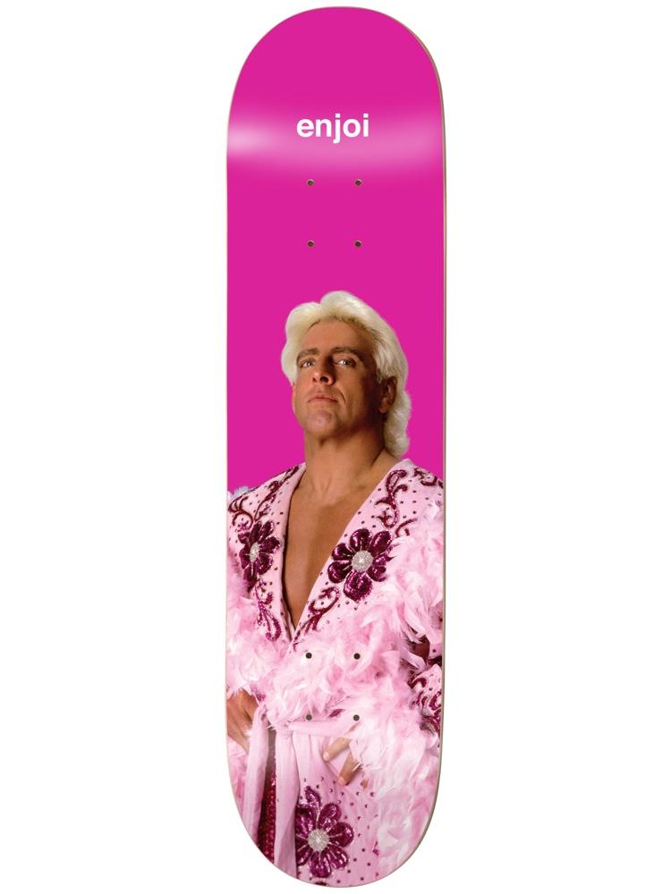 Enjoi The Nature Boy Ric Flair R7 8.25 skateboard deck: A photograph of a blond-haired wrestler in a pink feathered, sequinned robe with floral decoration, hands on hips, on a hot pink background. The small Enjoi name is at the top.