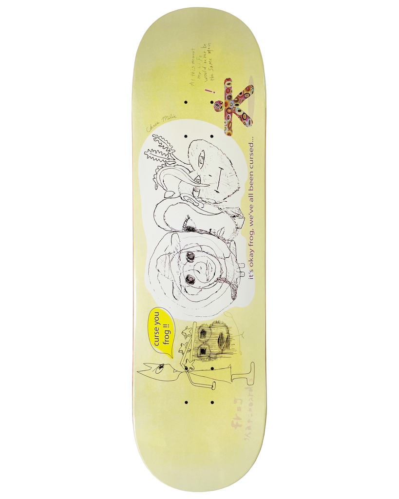 Frog Cursed (Milic) 8.5 skateboard deck: Loose pen drawings of odd faces and a small figure on a pale yellow deck, with a speech bubble 'curse you frog !!' and the line 'it's okay frog, we've all been cursed...', plus a small colourful patterned X shape near the top.