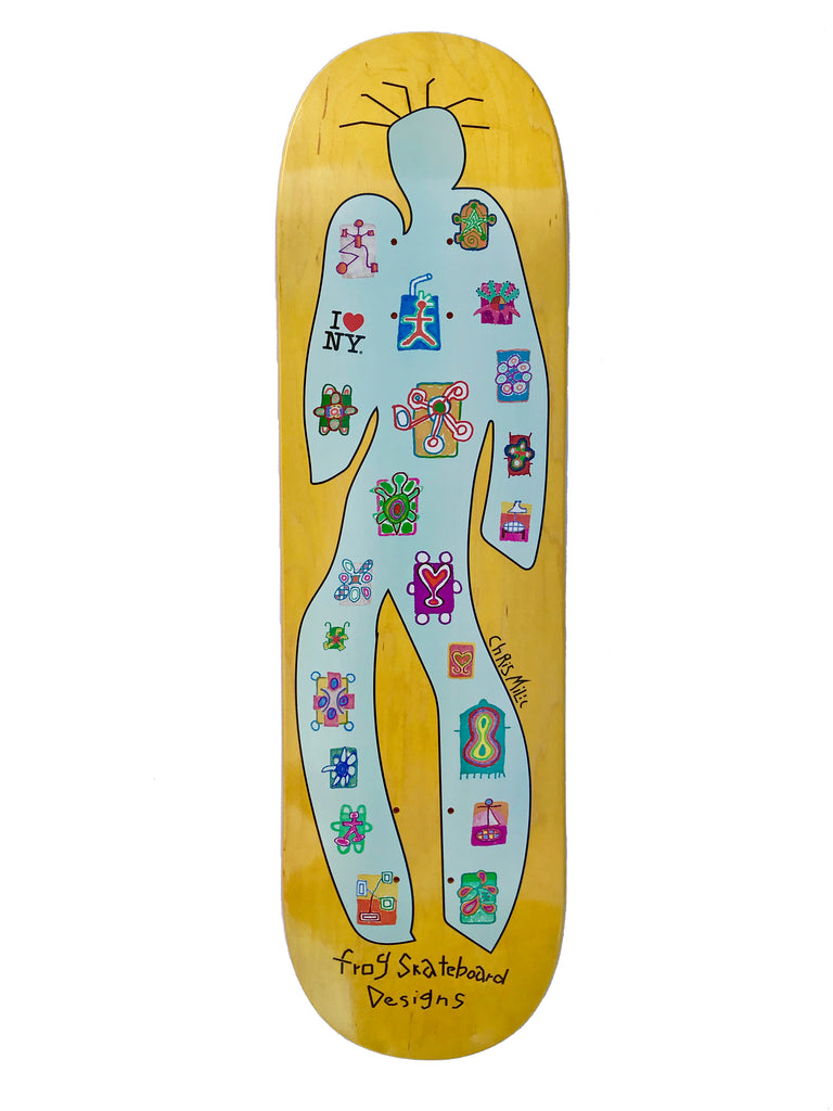 Frog Designs (chris milic) 8.6 skateboard deck: A pale blue human silhouette with spiky rays around the head on a yellow wood deck, filled with small colourful doodle icons, an I Love NY logo on the chest and handwritten artist and brand names.