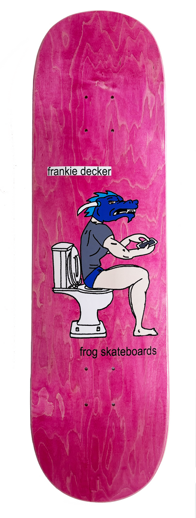 Frog Locked In - Frankie Decker skateboard deck: Cartoon blue dragon-headed figure in a grey t-shirt and blue shorts sitting on a toilet, looking at a phone. Rider name and brand are in small black text on white labels on a pink stained deck.