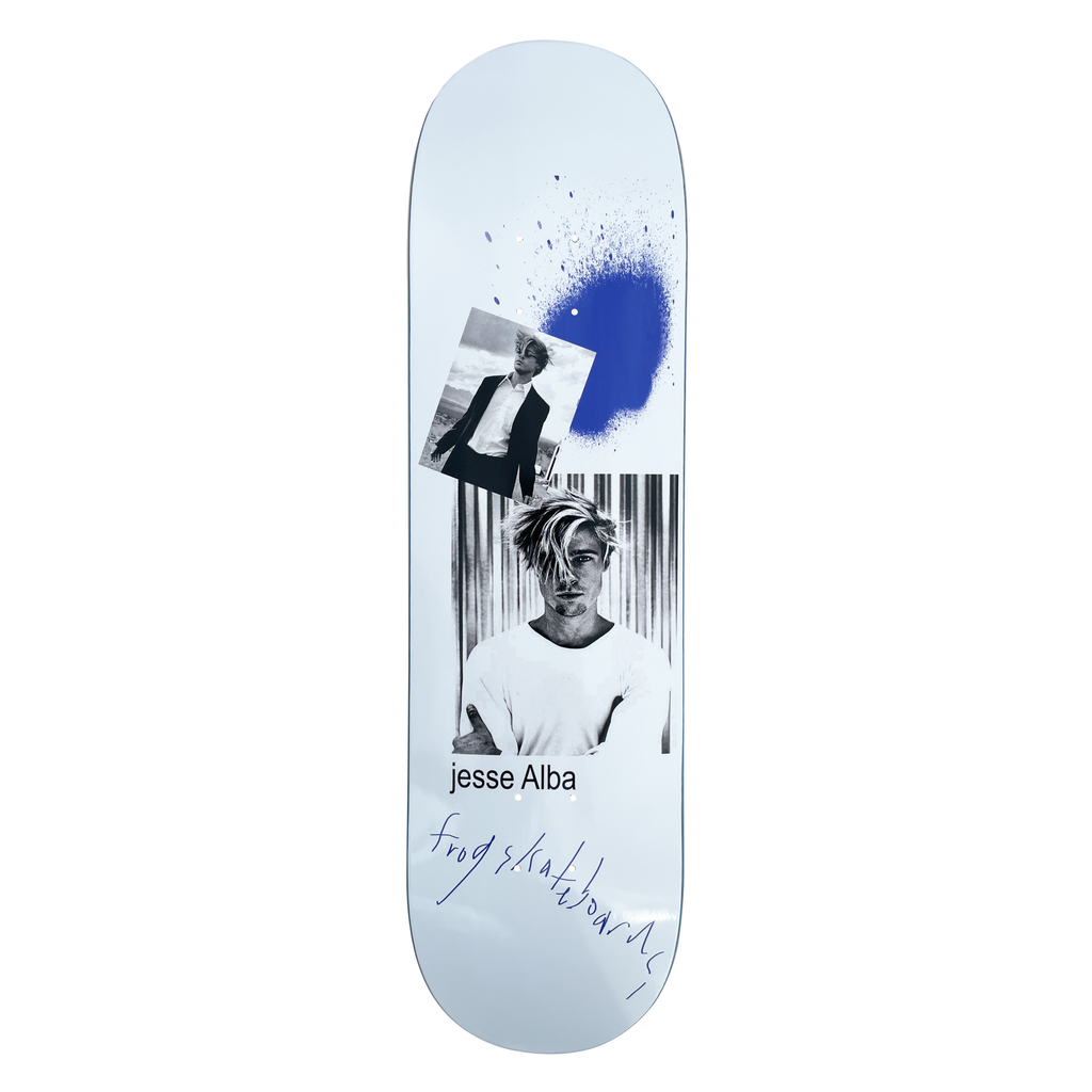 Frog Role Model (Jesse Alba) skateboard deck: Collage of two black and white photos of a blond man, one in a suit on a beach and one in a white t-shirt, with a blue spray-paint splash on a pale blue deck. Handwritten Frog Skateboards signature at the bottom.