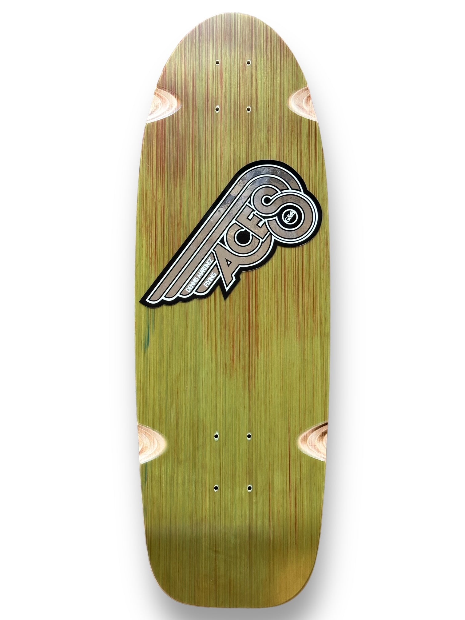 G&S Fibreflex Dennis Martinezs Flying Aces - Red/ Green Multi skateboard deck: Old-school shaped deck in a green-stained wood with red streaks, carrying a silver and grey winged Aces logo set on a diagonal with a black outline. Exposed wood wheel-well cut-outs show at the corners.