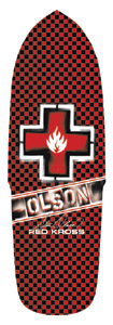 Black Label Steve Olson Ltd 2 skateboard deck: A red and black checkerboard pattern on a cruiser-style shaped deck, with a red cross containing a white flame logo, and a banner reading OLSON with a signature and Red Kross beneath.