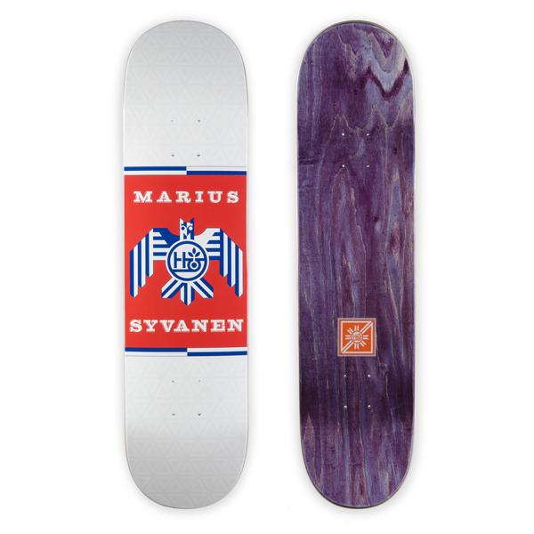 Habitat Marius Raptor Terratone skateboard deck: Red panel with a blue and white geometric eagle holding a circular Habitat emblem, with Marius Syvanen in cream serif capitals above and below, on a pale silver deck.