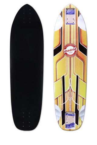Madrid 2019 Pro Series Dominant 34.5 skateboard deck: A symmetrical pinstripe design of yellow, gold, brown and black stripes and chevrons running up a narrow longboard deck, with a round red Madrid logo in the centre. The photo also shows the plain black grip side.