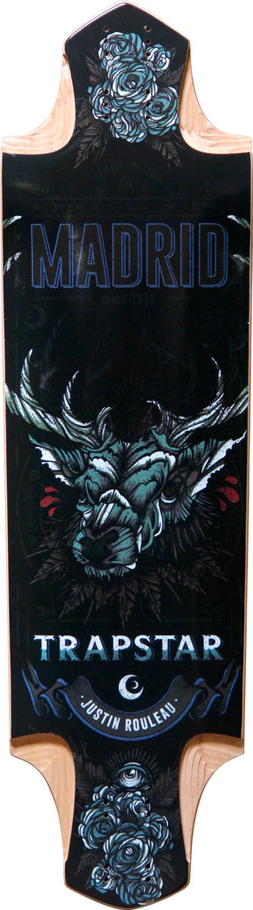 Madrid Pro Series Trapstar 36 skateboard deck: A drop-through longboard with a dark illustration of a stag's head with large antlers, blue roses at both ends and an eye symbol in a roses cluster. The brand and series names appear in blue and white lettering on a black deck.
