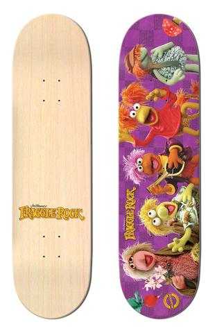 Madrid x Fraggle Rock Fraggle Five 8 skateboard deck: Photographic group of five Fraggle Rock puppets, including Red, Mokey and Wembley, on a purple checked background with the Fraggle Rock logo. The underside shows a natural wood deck with the logo.