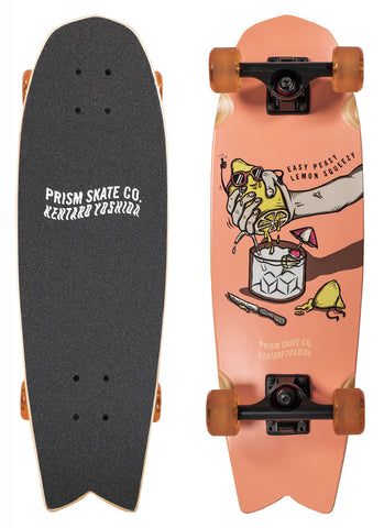 Prism Skate Co. Prism Grit 27 skateboard deck: Peach-coloured cruiser with an illustration of a hand squeezing a lemon in sunglasses into a glass of ice with a cocktail umbrella, with a knife and lemon half beside it and the text Easy Peasy Lemon Squeezy. Black grip with Prism Skate Co. on top.