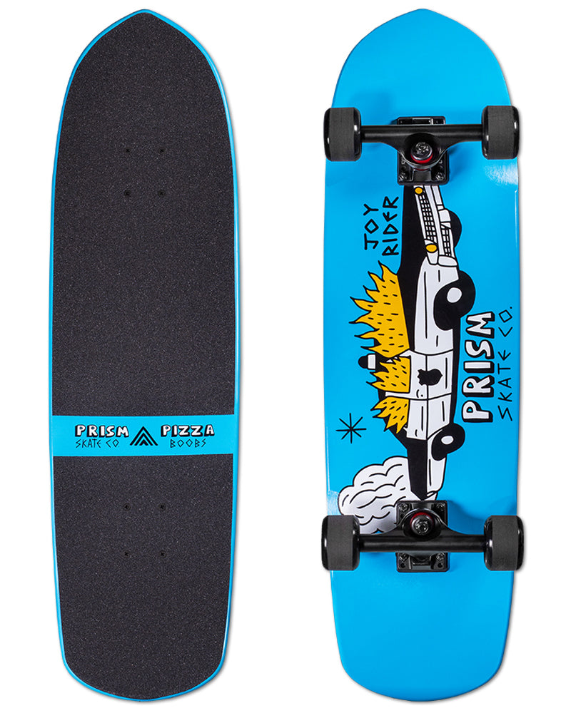 Prism Skate Co. Prism Mash 32 skateboard deck: Cartoon-style white police car with a yellow flame-like mane, speeding through a puff of smoke, drawn lengthwise on a bright blue deck with hand-lettered brand text. Grip side has a blue band reading the brand and 'Pizza Boobs'.