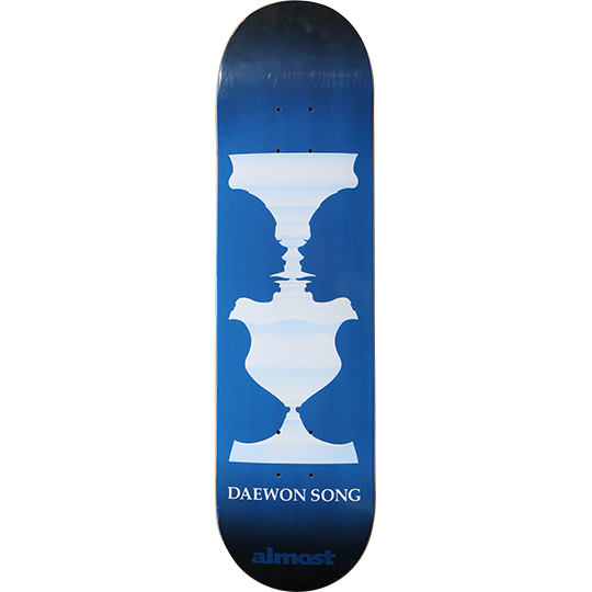 Almost Daewon Song Vase skateboard deck: Blue gradient deck with a pale blue optical-illusion vase made from two facing profile silhouettes, repeated as a double vase. Rider name in white capitals below and Almost logo at the foot.