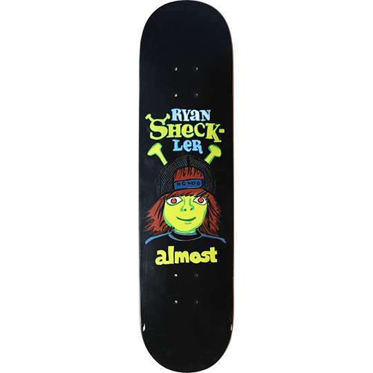 Almost Ryan Sheckler skateboard deck: Cartoon of a green-faced kid in a backwards red-brown cap and long hair with green antenna-like ears, resembling an ogre, above almost lettering, with RYAN SHECK-LER in colourful type on black.