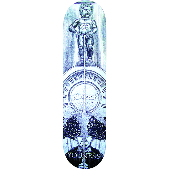 Almost Youness Amrani Manneken Pis skateboard deck: Monochrome engraving-style artwork of the Manneken Pis statue on a pedestal, its stream running down through a round Almost emblem to a figure beneath two spotted umbrellas. Fine line-hatched background.