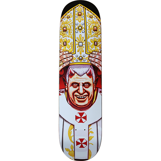 Blind Devil Pope skateboard deck: A grinning papal figure with red devil horns and wide eyes, hands gripping a tall gold and white ornate mitre. White vestments carry red and white umbrella-style emblems on a white deck.