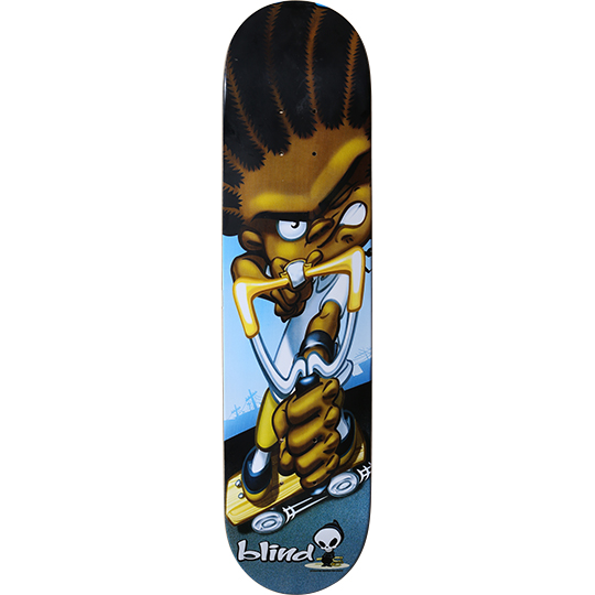 Blind Drive-by 2 skateboard deck: A cartoon character with braids and a large afro grips a slingshot, drawn back and aimed down, while standing on a tiny skateboard on a street under a blue sky. The Blind logo is at the bottom.