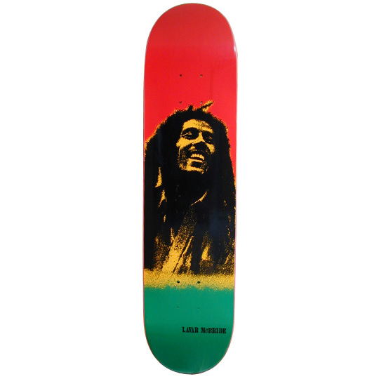 Blind Lavar McBride Bob Marley skateboard deck: Black and gold screen-print portrait of a smiling man with dreadlocks over red, gold and green horizontal bands, with the rider's name in small black type at the bottom.