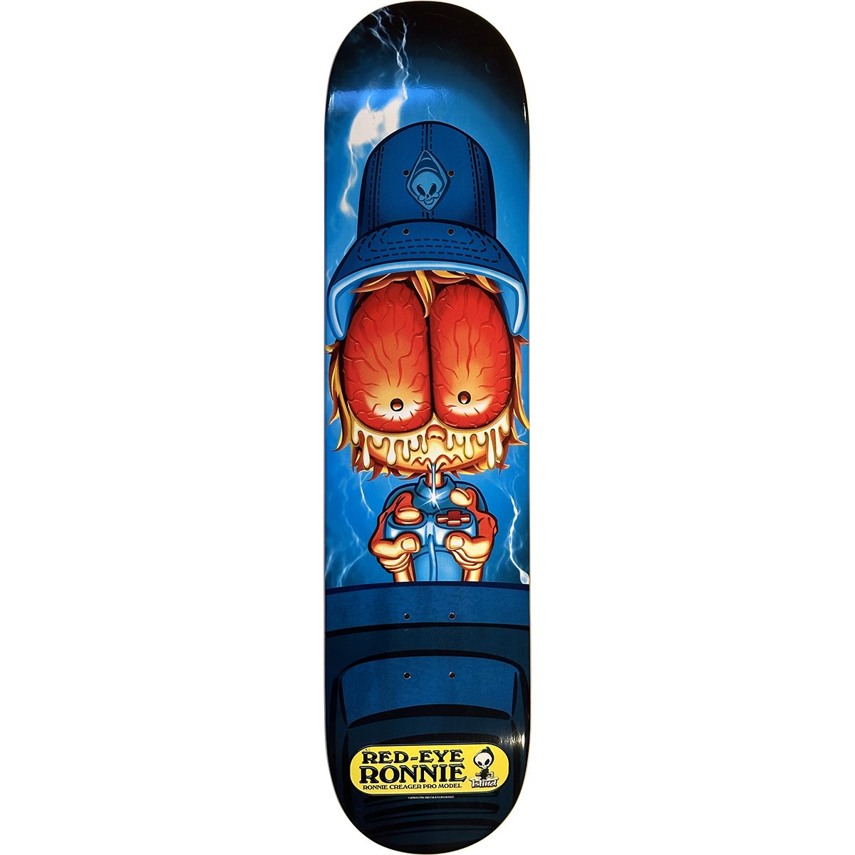 Blind Ronnie Creager Red-Eye Ronnie (pg version) skateboard deck: Cartoon character in a blue bucket hat with a reaper logo, with huge bloodshot red eyes bulging out and dripping, holding a game controller against a blue background with lightning. Yellow Red-Eye Ronnie pro model label at the tail.