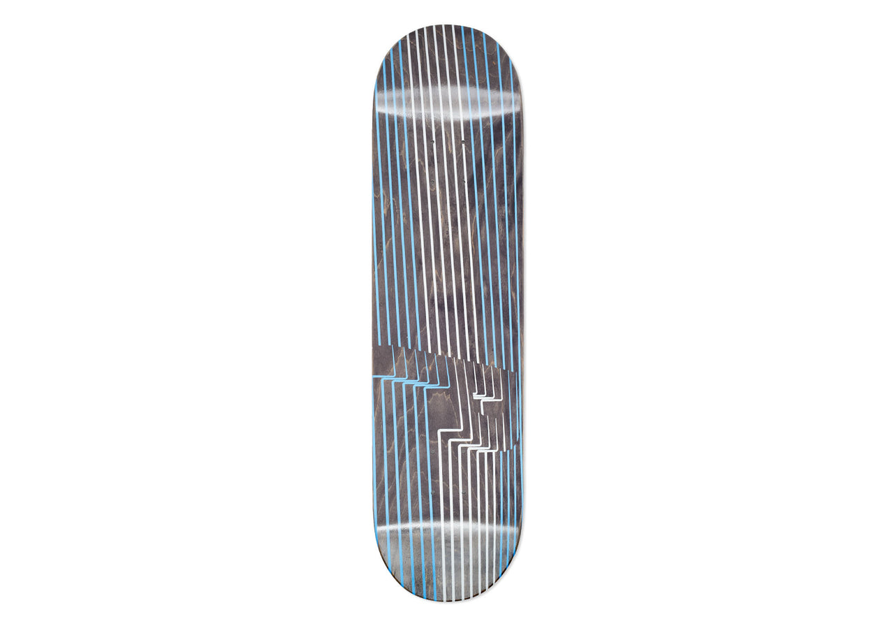 Palace Drury P1 8.1 skateboard deck: Vertical white and pale blue lines run the length of a dark grey stained deck, with the lines stepping and breaking in a zigzag near the middle, giving an optical, abstract effect.