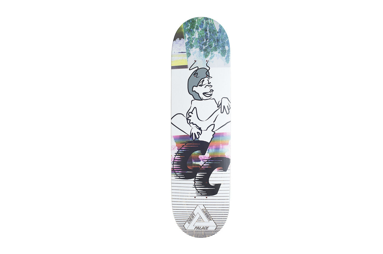 Palace Knight Re - Up Chewy Board skateboard deck: White deck with a line-drawn cartoon figure with dark hair, arms wrapped around itself, above bold black GC letters with a rainbow glitch band. A collage of leaves and colour strips sits at the nose and a Palace triangle logo at the tail.