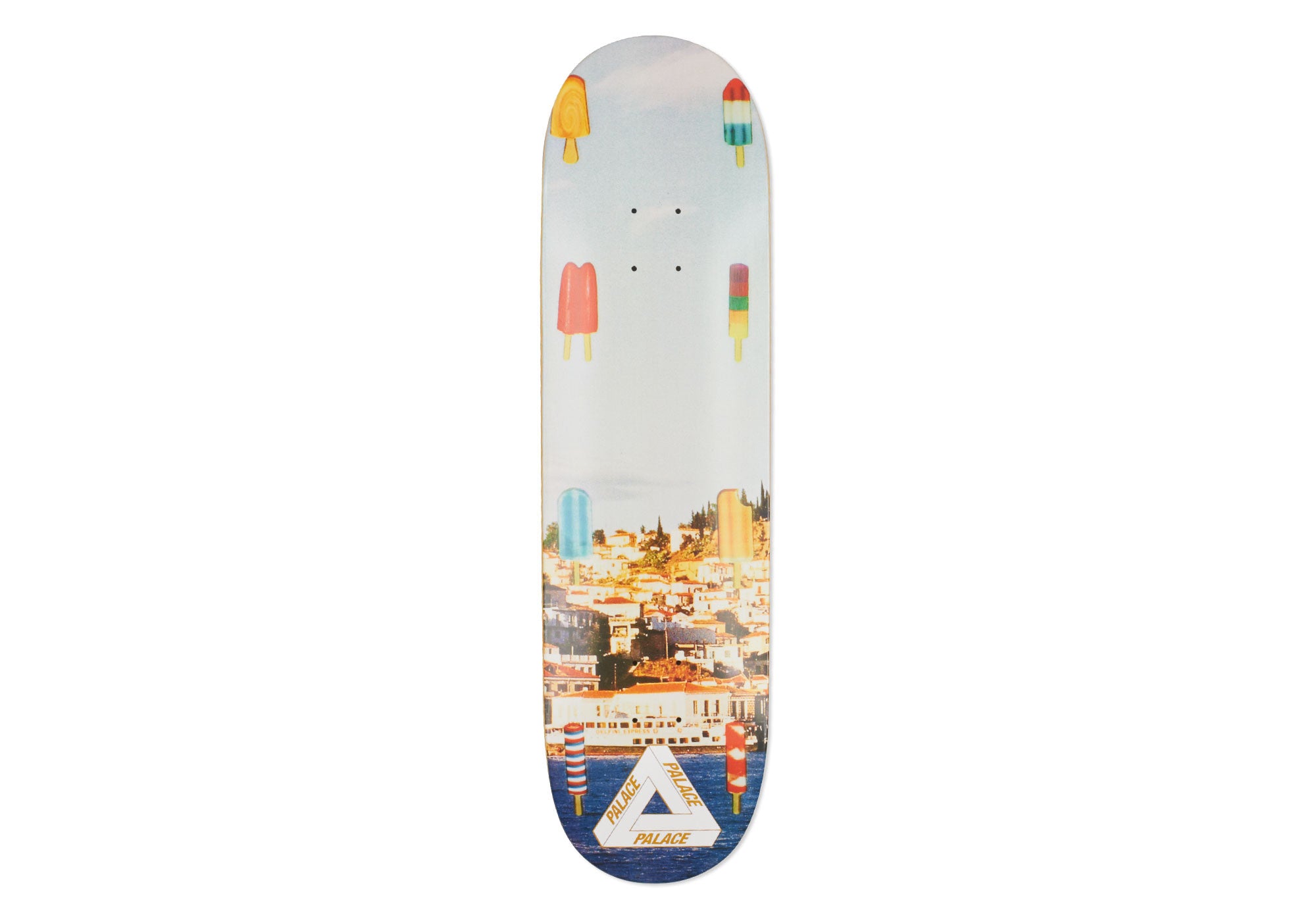 Palace Lollies 8.5 skateboard deck: Photograph of a hillside harbour town with a ferry in the water, overlaid with colourful ice lollies floating in the sky and sea. The Palace tri-ferg logo sits at the tail.