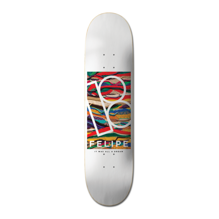 Plan B Felipe Gustavo Koogie - Pro skateboard deck: White deck with a rectangular photo panel of multicoloured knitted Coogi-style jumper texture, overlaid with the white outlined Plan B logo. Felipe and a small tagline sit below.