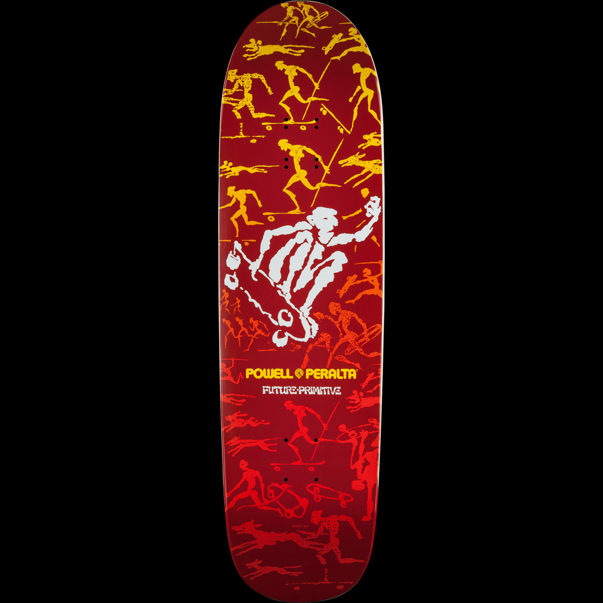 Powell Peralta Future Primitive Red skateboard deck: Red deck with a large white stylised skater mid-air, surrounded by repeating tribal-style running and skating figures fading from yellow at the nose to red at the tail. Powell Peralta and Future Primitive text.